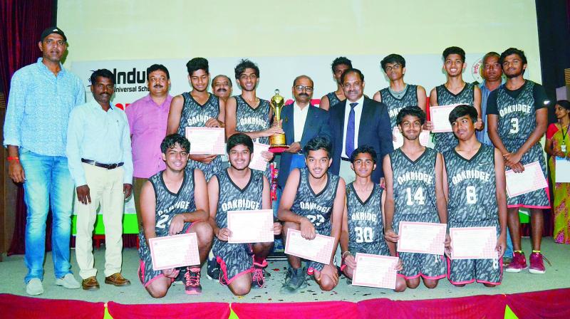 Oakridge International School’s Under-19 basketball players are all smiles as they pose with the CBSE Cluster VII Basketball winner’s trophy from A. Dinakar Babu, Vice-Chairman & Managing Director of Sports Authority of Telangana State, at the Indus Universal School in Yapral, Secunderabad. Oakridge International School’s Under-19 basketball players are all smiles as they pose with the CBSE Cluster VII Basketball winner’s trophy from A. Dinakar Babu, Vice-Chairman & Managing Director of Sports Authority of Telangana State, at the Indus Universal School in Yapral, Secunderabad.