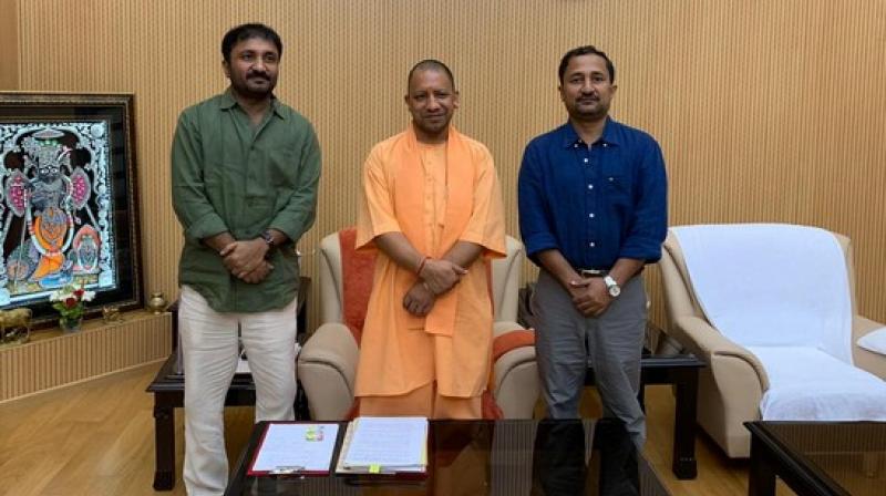 Anand Kumar with UP CM Yogi Adityanath. (Photo: ANI) Anand Kumar with UP CM Yogi Adityanath. (Photo: ANI)