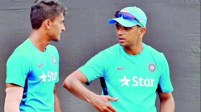 India A and U19 team coach Rahul Dravid (right) in file pic. India A and U19 team coach Rahul Dravid (right) in file pic.