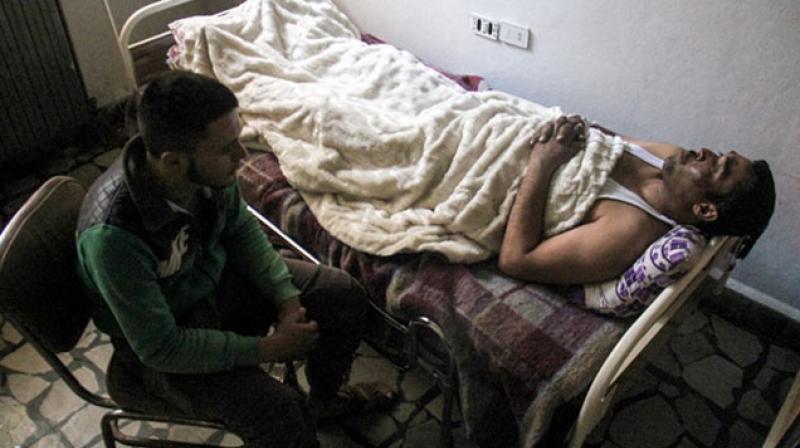 40-year-old Hassan Youssef, a victim of the chemical gas attack in Syria, receiving medical care. (AFP) 40-year-old Hassan Youssef, a victim of the chemical gas attack in Syria, receiving medical care. (AFP)