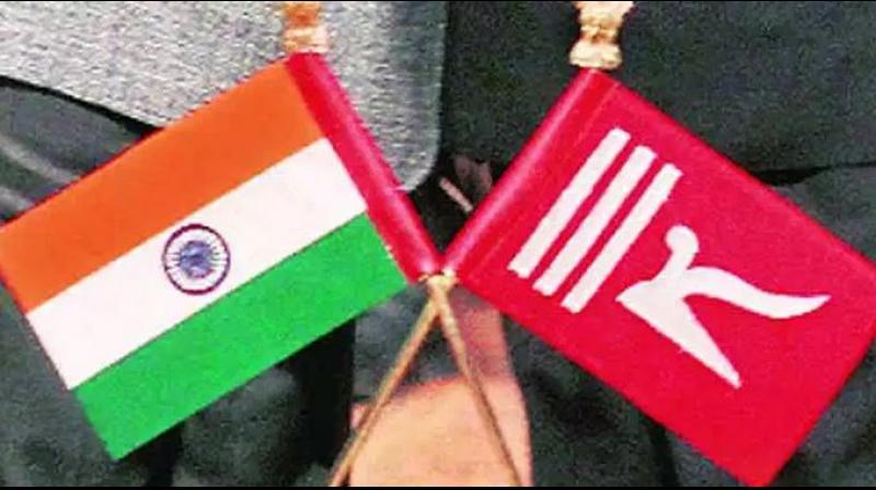 The Indian flag alongside the flag of Jammu and Kashmir. (Photo: File) The Indian flag alongside the flag of Jammu and Kashmir. (Photo: File)