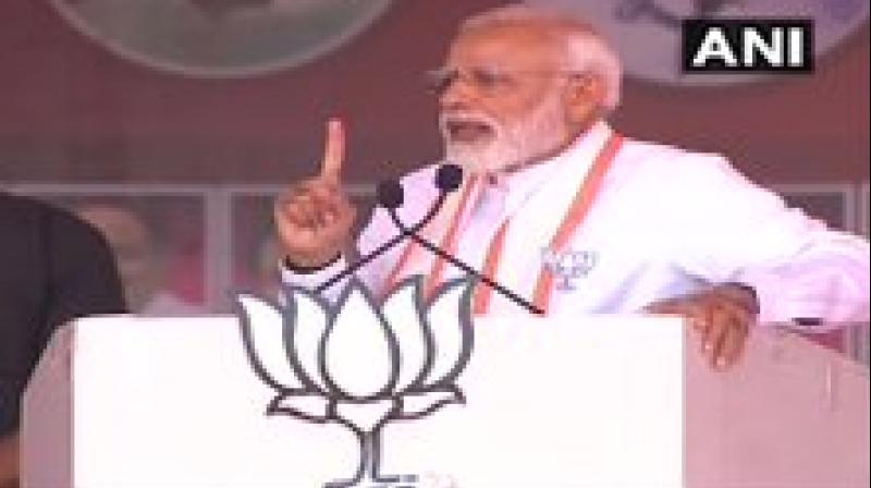 'In an attempt to mislead the people, all the corrupt have ganged up in an attempt to defeat Modi,' Modi said. (Photo: ANI) 'In an attempt to mislead the people, all the corrupt have ganged up in an attempt to defeat Modi,' Modi said. (Photo: ANI)