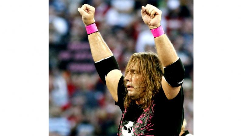 Renowned wrestler Bret Hart was tackled while he was giving a speech during the WWE Hall of Fame ceremony at Barclays Center. (Photo: AP) Renowned wrestler Bret Hart was tackled while he was giving a speech during the WWE Hall of Fame ceremony at Barclays Center. (Photo: AP)