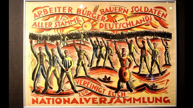 A historic poster is displayed at the exhibition, reads: ' Workers, Citizen, Farmer, Soldiers of all German tribes united for the National Assembly.' (Photo: AP) A historic poster is displayed at the exhibition, reads: ' Workers, Citizen, Farmer, Soldiers of all German tribes united for the National Assembly.' (Photo: AP)