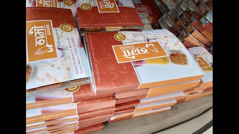Some policemen on election duty here were served meals in packets labelled 'Namo Foods', following which officials clarified that those were procured from Namo Food Shop and not from any political party. (Photo: Twitter/ @Hassanbadshah) Some policemen on election duty here were served meals in packets labelled 'Namo Foods', following which officials clarified that those were procured from Namo Food Shop and not from any political party. (Photo: Twitter/ @Hassanbadshah)