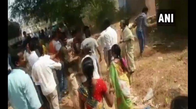 Clashes broke out on Thursday between workers of Telugu Desam Party and YSR Congress at various places in Andhra Pradesh even as technical glitches in Electronic Voting Machines hampered the poll process at numerous polling booths as voting got underway for 25 Lok Sabha and 175 Assembly seats. (Photo: Screengrab/ ANI Twitter) Clashes broke out on Thursday between workers of Telugu Desam Party and YSR Congress at various places in Andhra Pradesh even as technical glitches in Electronic Voting Machines hampered the poll process at numerous polling booths as voting got underway for 25 Lok Sabha and 175 Assembly seats. (Photo: Screengrab/ ANI Twitter)