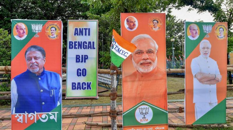 West Bengal wing of the BJP alleged that the placards with messages – 'BJP, leave Bengal' and 'anti-Bengal BJP go back' – were put up by the ruling Trinamool Congress led by Mamata Banerjee. (Photo: PTI) West Bengal wing of the BJP alleged that the placards with messages – 'BJP, leave Bengal' and 'anti-Bengal BJP go back' – were put up by the ruling Trinamool Congress led by Mamata Banerjee. (Photo: PTI)