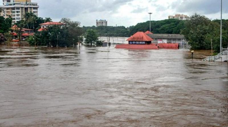 Aluva Mahadeva Temple is seen submerged in the water following a flash flood, triggered by heavy rains, at Kochi in Kerala. (Photo: PTI) Aluva Mahadeva Temple is seen submerged in the water following a flash flood, triggered by heavy rains, at Kochi in Kerala. (Photo: PTI)