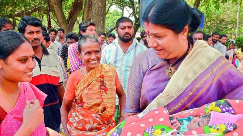 Women’s panel chairperson Nannapaneni Rajakumari cradles a newborn during her visit to the Old Government Hospital in Vijayawada. (File Photo) Women’s panel chairperson Nannapaneni Rajakumari cradles a newborn during her visit to the Old Government Hospital in Vijayawada. (File Photo)