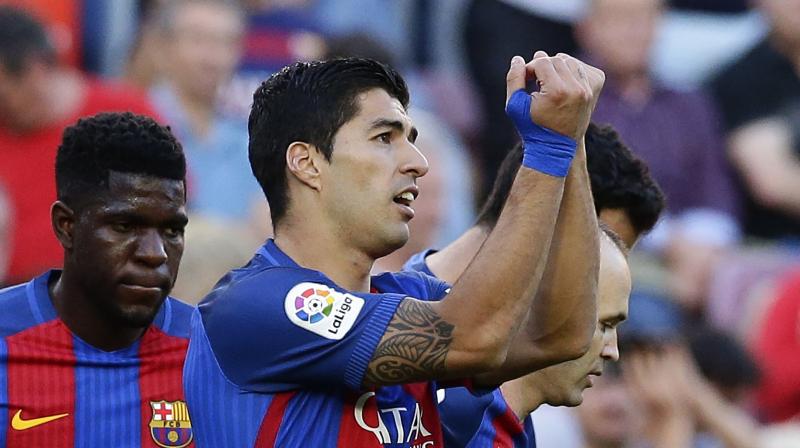 Luis Suarez took the MSN tally to 101 and killed the game off as a contest when he turned Jaume Costa and fired low and hard past Fernandez. (Photo: AP) Luis Suarez took the MSN tally to 101 and killed the game off as a contest when he turned Jaume Costa and fired low and hard past Fernandez. (Photo: AP)
