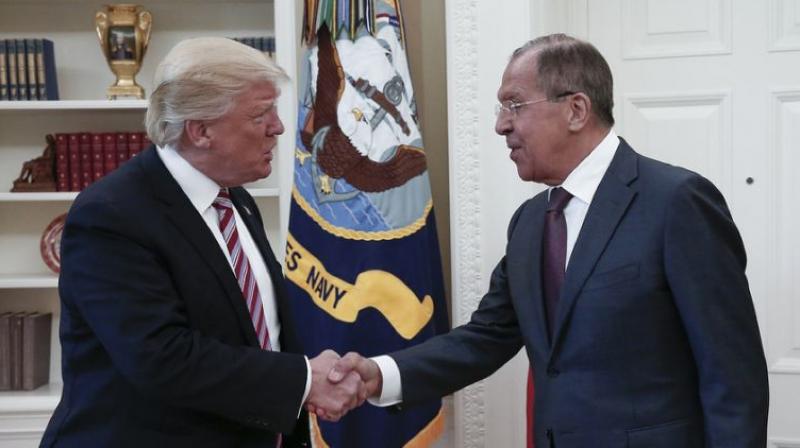 President Donald Trump meeting with Russia's Sergei Lavrov in the Oval Office were issued by the Russian state news agency TASS, and subsequently published by much of the global media (Photo: AFP) President Donald Trump meeting with Russia's Sergei Lavrov in the Oval Office were issued by the Russian state news agency TASS, and subsequently published by much of the global media (Photo: AFP)