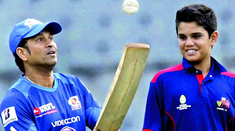 Sachin Tendulkar with his son, Arjun Sachin Tendulkar with his son, Arjun