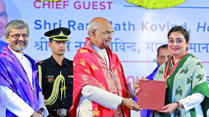 President Ram Nath Kovind presents a certificate to a student during the 7th convocation of Indian Institute of Technology Hyderabad at Kandi in Sangareddy district on Sunday. President Ram Nath Kovind presents a certificate to a student during the 7th convocation of Indian Institute of Technology Hyderabad at Kandi in Sangareddy district on Sunday.
