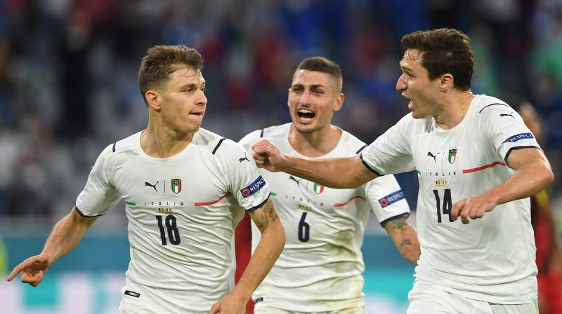 Italy midfielder Nicolo Barella (left) celebrates with teammates after scoring their first goal during the quarterfinal clash against Belgium at the Allianz Arena in Munich on Friday. (Photo: AFP) Italy midfielder Nicolo Barella (left) celebrates with teammates after scoring their first goal during the quarterfinal clash against Belgium at the Allianz Arena in Munich on Friday. (Photo: AFP)
