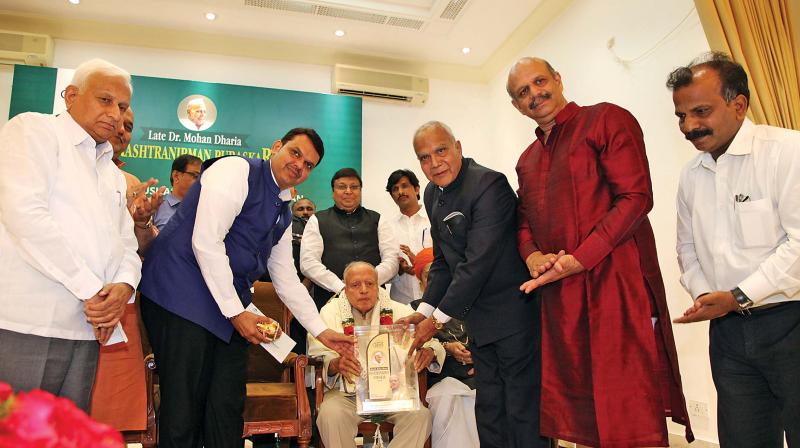 Banwarilal Purohit presents the late Dr Mohan Dharia Rastranirman Puraskar 2018 Award to Padma Vibhushan Dr M.S. Swaminathan at Raj Bhavan, on Saturday. Image; DC Banwarilal Purohit presents the late Dr Mohan Dharia Rastranirman Puraskar 2018 Award to Padma Vibhushan Dr M.S. Swaminathan at Raj Bhavan, on Saturday. Image; DC