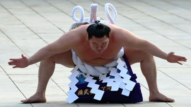 The move was seen as an indication of Hakuho's intention to remain in the sumo world after he eventually retires. (Photo: AFP) The move was seen as an indication of Hakuho's intention to remain in the sumo world after he eventually retires. (Photo: AFP)