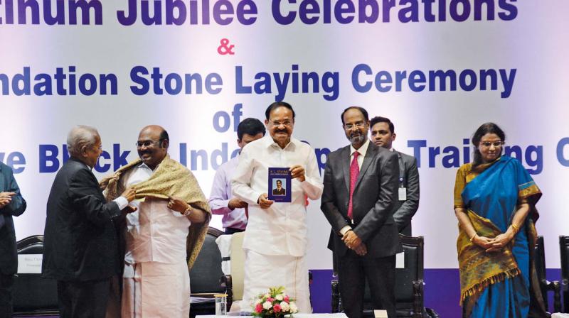 VP M.Venkaiah Naidu with the biography of V.L. Ethiraj, the founder of Ethiraj College for Women on Thursday. Image: DC VP M.Venkaiah Naidu with the biography of V.L. Ethiraj, the founder of Ethiraj College for Women on Thursday. Image: DC