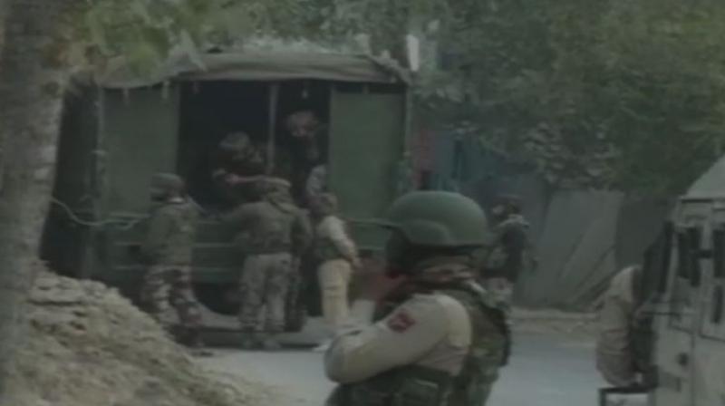 The encounter between security forces and militants in Hajin area of north Kashmir's district is underway. (Photo: Twitter | ANI) The encounter between security forces and militants in Hajin area of north Kashmir's district is underway. (Photo: Twitter | ANI)