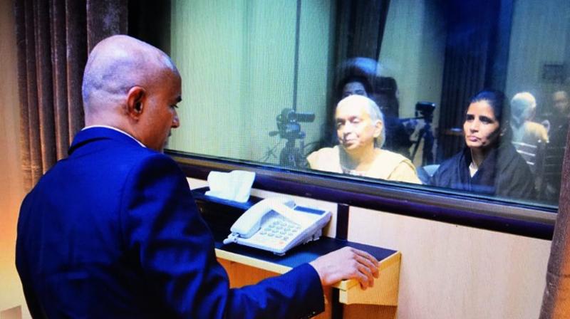 Picture tweeted by news agency ANI from a Pakistan media where Kulbhushan Jadhav is seen meeting his wife and mother in Pakistan. (Photo: Twitter | ANI) Picture tweeted by news agency ANI from a Pakistan media where Kulbhushan Jadhav is seen meeting his wife and mother in Pakistan. (Photo: Twitter | ANI)