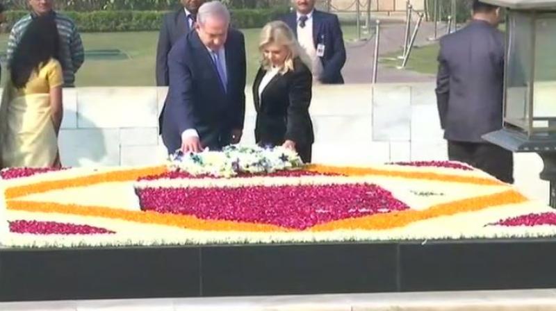 After getting a ceremonial reception at the Rashtrapati Bhavan Netanyahu and his wife moved to Rajghat where they paid tributes to Mahatma Gandhi