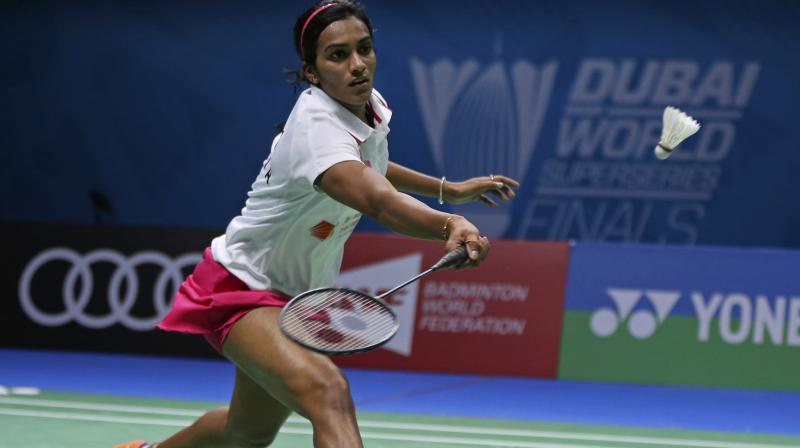 PV Sindhu beat a higher-ranked Akane Yamaguchi of Japan in an entertaining opening women's singles Group B match. (Photo: AP) PV Sindhu beat a higher-ranked Akane Yamaguchi of Japan in an entertaining opening women's singles Group B match. (Photo: AP)