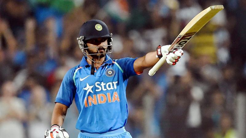 Kedar Jadhav celebrates his maiden ODI hundred. (Photo: PTI) Kedar Jadhav celebrates his maiden ODI hundred. (Photo: PTI)