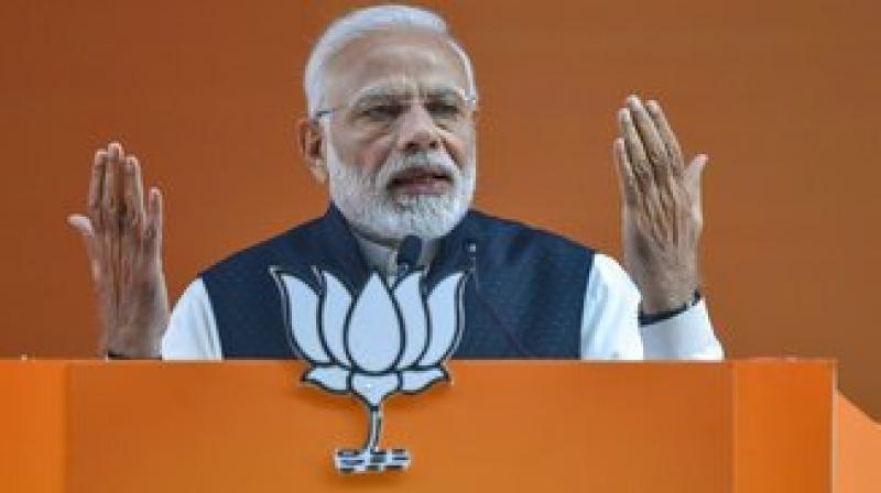 ‘We want a strong government so that we can put an end to corruption. These days there is a failed experiment taking place in the country which is known as the grand alliance,’ PM Modi said. (Photo: PTI) ‘We want a strong government so that we can put an end to corruption. These days there is a failed experiment taking place in the country which is known as the grand alliance,’ PM Modi said. (Photo: PTI)