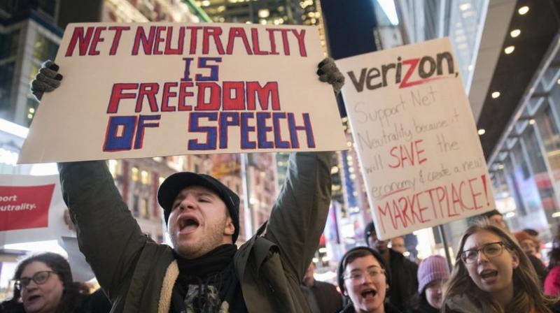 Demonstrators rally in support of net neutrality outside a Verizon store in New York. Any changes are likely to happen slowly, and companies will try to make sure that consumers are on board with the moves, experts say. (AP Photo/Mary Altaffer, File) Demonstrators rally in support of net neutrality outside a Verizon store in New York. Any changes are likely to happen slowly, and companies will try to make sure that consumers are on board with the moves, experts say. (AP Photo/Mary Altaffer, File)