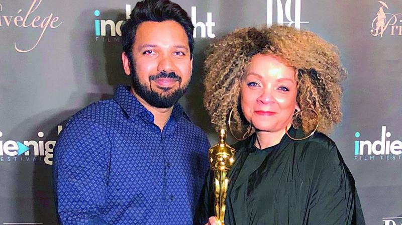 Raj Rohit Reddy with Ruth E. Carter Raj Rohit Reddy with Ruth E. Carter