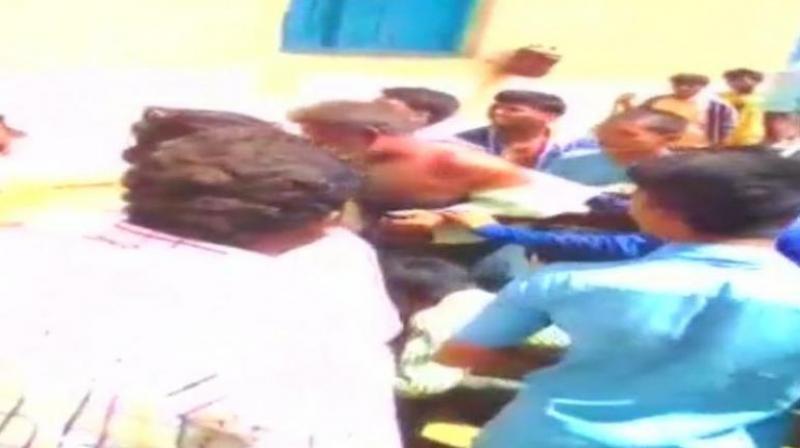 According to police officials and locals, the victims were first attacked by a group of 'highly inebriated' people in Kakar pada, a village adjoining Rainpada village. (Photo: ANI) According to police officials and locals, the victims were first attacked by a group of 'highly inebriated' people in Kakar pada, a village adjoining Rainpada village. (Photo: ANI)