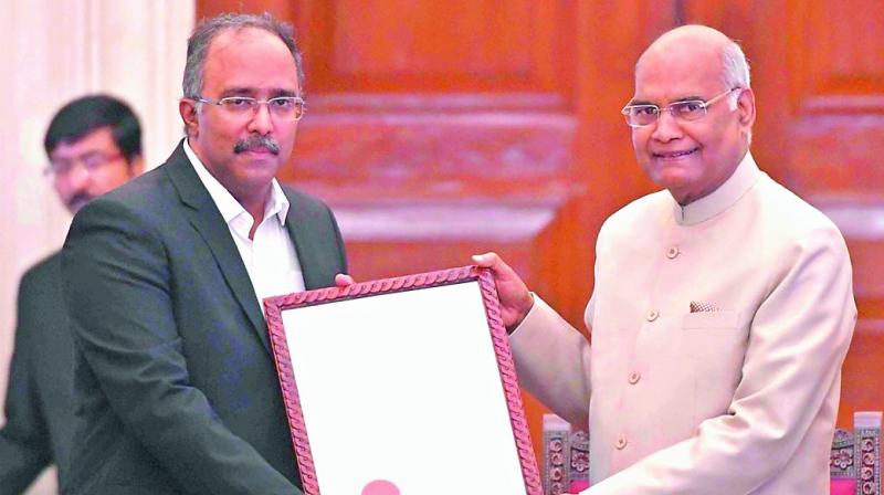 Prof. Pramod K. Nayar receives the Visitor’s Award from President Ramnath Kovind on Wednesday at Rashtrapati Bhavan in Delhi. Prof. Pramod K. Nayar receives the Visitor’s Award from President Ramnath Kovind on Wednesday at Rashtrapati Bhavan in Delhi.