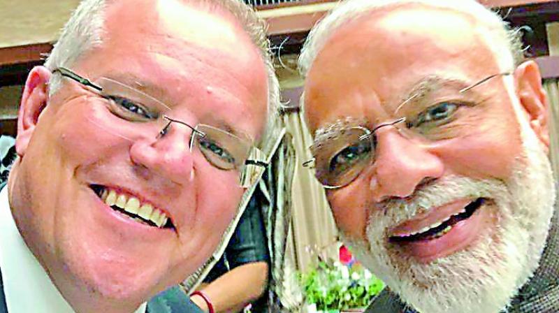 Australian Prime Minister Scott Morrison on Saturday tweeted a selfie with Narendra Modi. Australian Prime Minister Scott Morrison on Saturday tweeted a selfie with Narendra Modi.