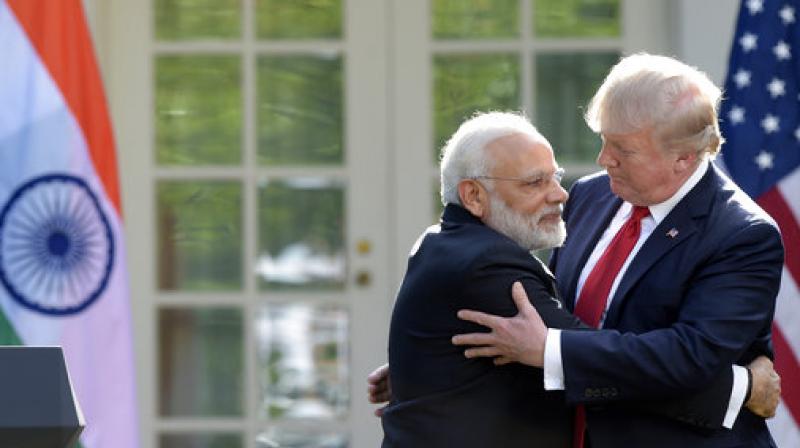 President Donald Trump and Prime Minister Narendra Modi hug while making statements in the Rose Garden of the White House in Washington. (Photo: AP) President Donald Trump and Prime Minister Narendra Modi hug while making statements in the Rose Garden of the White House in Washington. (Photo: AP)