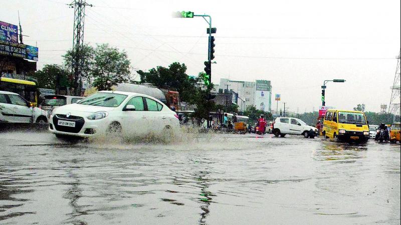 Vehicles ply through water clogged roads in the city on Thursday. (Photo:DC) Vehicles ply through water clogged roads in the city on Thursday. (Photo:DC)