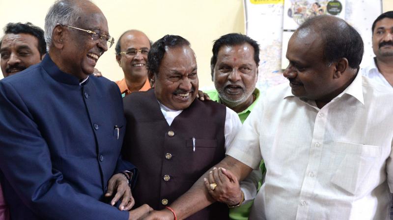 Council chairman D. H. Shankaramurthy being greeted by JD(S) state chief H.D. Kumaraswamy after winning the trust vote. Council chairman D. H. Shankaramurthy being greeted by JD(S) state chief H.D. Kumaraswamy after winning the trust vote.