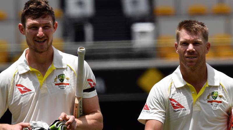 Banned Australian player Cameron Bancroft confirmed David Warner asked him to alter the ball during the tampering scandal in South Africa and said he went along with it "to fit in". (Photo: AFP) Banned Australian player Cameron Bancroft confirmed David Warner asked him to alter the ball during the tampering scandal in South Africa and said he went along with it "to fit in". (Photo: AFP)