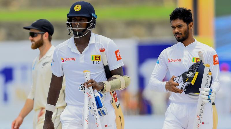 After stitching a 161-run first-wicket partnership with skipper Dimuth Karunaratne, Lahiru Thirimanne (64) was caught in front of the wickets by William Somerville. (Photo: AFP) After stitching a 161-run first-wicket partnership with skipper Dimuth Karunaratne, Lahiru Thirimanne (64) was caught in front of the wickets by William Somerville. (Photo: AFP)