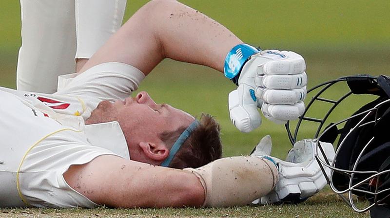Firstly he was struck on the elbow by Archer and soon after he received a striking blow on the neck by a bouncer bowled by the pacer and he immediately went down. (Photo: AFP) Firstly he was struck on the elbow by Archer and soon after he received a striking blow on the neck by a bouncer bowled by the pacer and he immediately went down. (Photo: AFP)