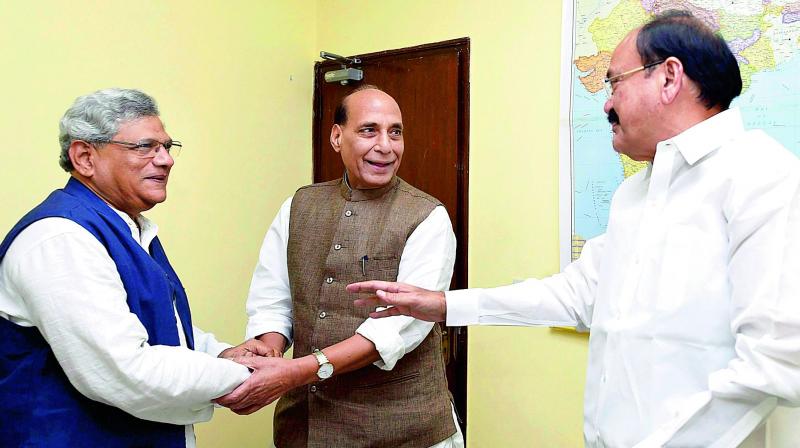 Union ministers Rajnath Singh and Venkaiah Naidu meet CPM general secretary Sitaram Yechury on Presidential election in New Delhi on Friday. (Photo: PTI) Union ministers Rajnath Singh and Venkaiah Naidu meet CPM general secretary Sitaram Yechury on Presidential election in New Delhi on Friday. (Photo: PTI)