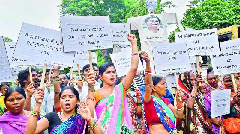 Bahujan Azad Party activists shout slogans during a protest against the Muzaffarpur shelter home rape case, in Patna on Tuesday. (Photo: PTI) Bahujan Azad Party activists shout slogans during a protest against the Muzaffarpur shelter home rape case, in Patna on Tuesday. (Photo: PTI)