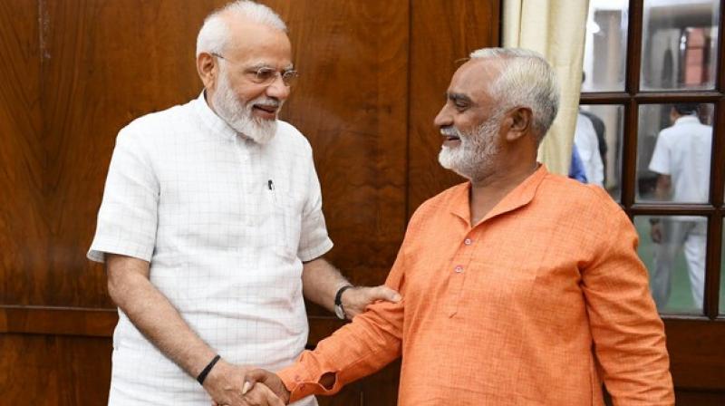 Modi also tweeted four photos alongside, one from the interaction and three others of Bhikhubhai from his journey. (Photo: ANI) Modi also tweeted four photos alongside, one from the interaction and three others of Bhikhubhai from his journey. (Photo: ANI)