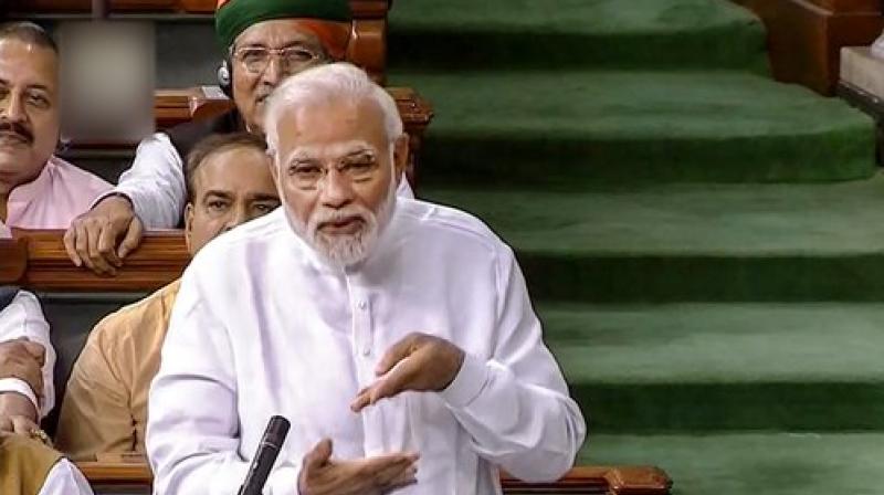 Prime Minister Narendra Modi speaks in the Lok Sabha on 'no-confidence motion' during the Monsoon Session of Parliament, in New Delhi. (Photo: LSTV GRAB via PTI) Prime Minister Narendra Modi speaks in the Lok Sabha on 'no-confidence motion' during the Monsoon Session of Parliament, in New Delhi. (Photo: LSTV GRAB via PTI)