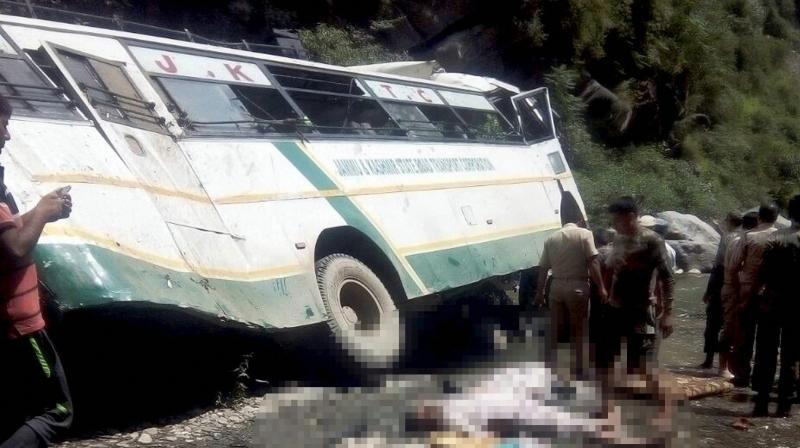 Security personnel carry out rescue work after a bus carrying Amarnath pilgrims falls into a gorge off Jammu-Srinagar National Highway in Ramban district on Sunday. (Photo: PTI) Security personnel carry out rescue work after a bus carrying Amarnath pilgrims falls into a gorge off Jammu-Srinagar National Highway in Ramban district on Sunday. (Photo: PTI)