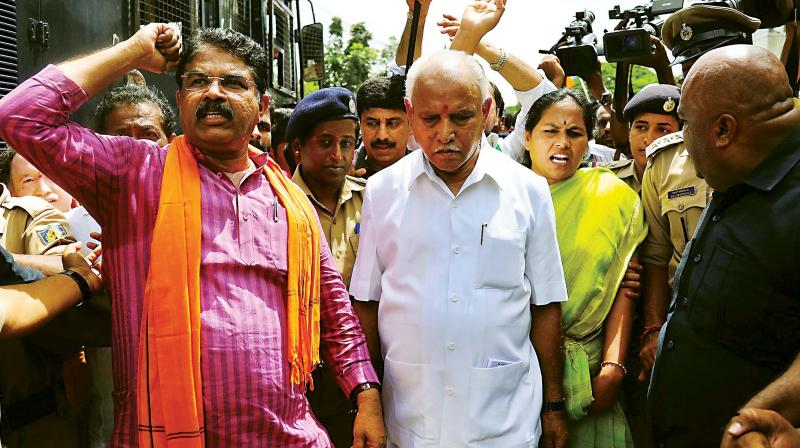 BJP state president B.S. Yeddyurappa and senior leaders of the party R. Ashok, Shobha Karandlaje and others were detained during their protest against state government at Freedom Park in Bengaluru on Friday. (Photo: SHASHIDHAR B.) BJP state president B.S. Yeddyurappa and senior leaders of the party R. Ashok, Shobha Karandlaje and others were detained during their protest against state government at Freedom Park in Bengaluru on Friday. (Photo: SHASHIDHAR B.)