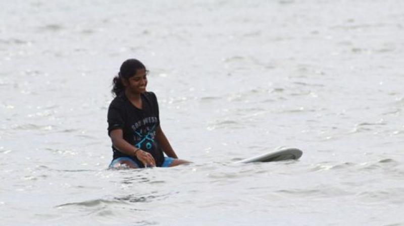 Tanvi, a first year pre-university student at Sharadha PU college in Mangaluru, started surfing at the age of 14 at Mantra Surf Club. (Photo: Tanvi Jagadish/ Facebook) Tanvi, a first year pre-university student at Sharadha PU college in Mangaluru, started surfing at the age of 14 at Mantra Surf Club. (Photo: Tanvi Jagadish/ Facebook)