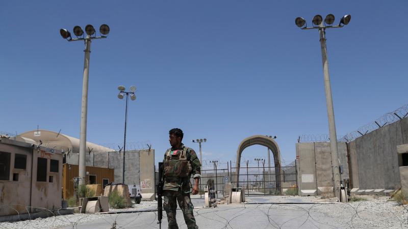 An Afghan National Army (ANA) soldier stands guard at Bagram Air Base, after all US and NATO troops left, some 70 Km north of Kabul. (Photo: AFP)