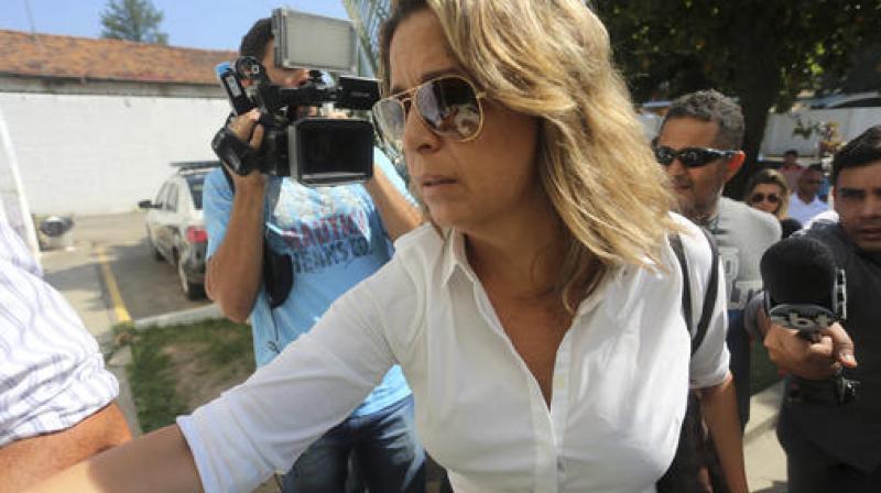 Francoise Amiridis, the wife of Greece's Ambassador to Brazil Kyriakos Amiridis, arrives at a police station to be interrogated in connection with her husband's disappearance. (Photo: AP) Francoise Amiridis, the wife of Greece's Ambassador to Brazil Kyriakos Amiridis, arrives at a police station to be interrogated in connection with her husband's disappearance. (Photo: AP)