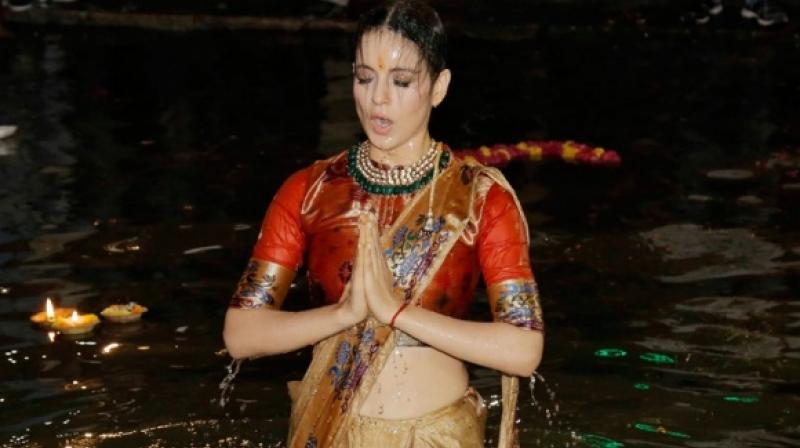 Hollywood action choreographer Nick Powell, who earlier worked in Hollywood films like Bourne Identity, Braveheart and Gladiator, is training Kangana. He is presently in Mumbai where Kangana is reportedly practising sword fighting with him Hollywood action choreographer Nick Powell, who earlier worked in Hollywood films like Bourne Identity, Braveheart and Gladiator, is training Kangana. He is presently in Mumbai where Kangana is reportedly practising sword fighting with him