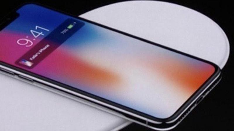 The iPhone X Tesla comes with the engraving 'Made on Earth by Humans', similar to the Tesla Roadster which SpaceX CEO Elon Musk sent in space. The iPhone X Tesla comes with the engraving 'Made on Earth by Humans', similar to the Tesla Roadster which SpaceX CEO Elon Musk sent in space.