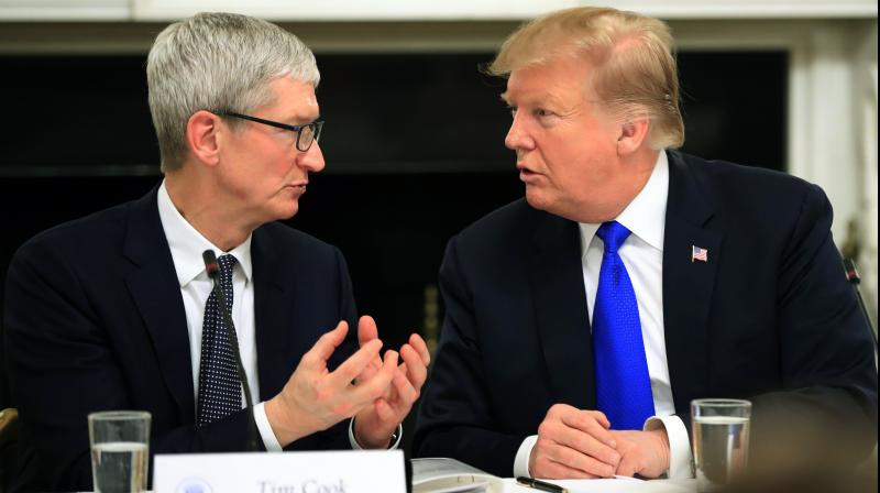 'We appreciate it very much, Tim Apple,' Trump said. (Photo:AP) 'We appreciate it very much, Tim Apple,' Trump said. (Photo:AP)